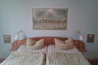 Ein Bett oder Betten in einem Zimmer der Unterkunft Ferien im Denkmal an der Elbe