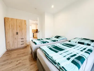 Ein Bett oder Betten in einem Zimmer der Unterkunft Ferienwohnung1 Grimma
