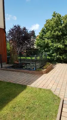 Ein Garten an der Unterkunft Ferienwohnung1 Grimma