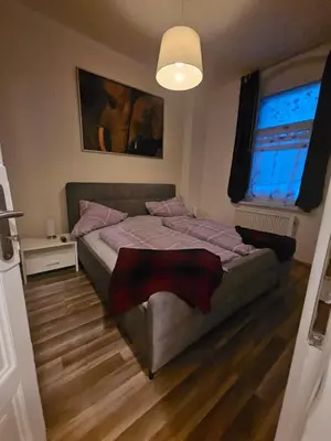 Ein Bett oder Betten in einem Zimmer der Unterkunft Max's Hinterhaus