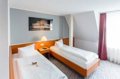 Ein Bett oder Betten in einem Zimmer der Unterkunft Hotel Kaiserhof