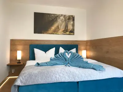 Ein Bett oder Betten in einem Zimmer der Unterkunft Pension 19