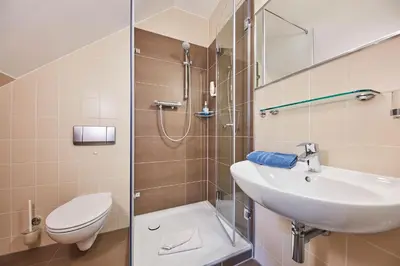 Ein Badezimmer in der Unterkunft Hotel garni Sonnenhof
