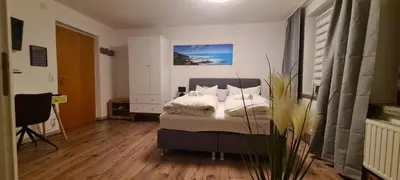 Ein Bett oder Betten in einem Zimmer der Unterkunft Pension Krone