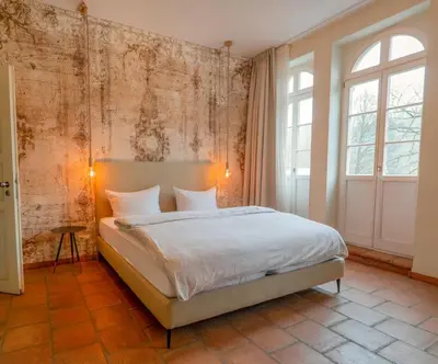 Ein Bett oder Betten in einem Zimmer der Unterkunft Albergo-Toscana