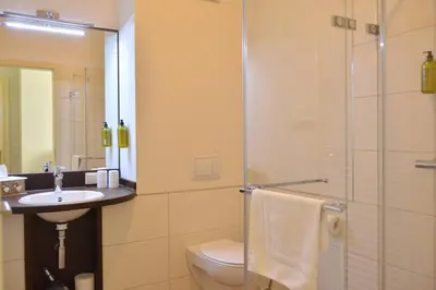 Ein Badezimmer in der Unterkunft Albergo-Toscana