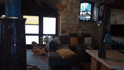 Ein Sitzbereich in der Unterkunft Ferienwohnung TOSCANA