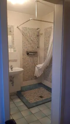 Ein Badezimmer in der Unterkunft Ferienwohnung TOSCANA
