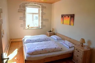 Ein Bett oder Betten in einem Zimmer der Unterkunft FEWO natuerlich-wolf