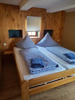 Ein Bett oder Betten in einem Zimmer der Unterkunft Gasthaus Stiller Fritz