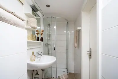 Ein Badezimmer in der Unterkunft Apartments am Schlosspark