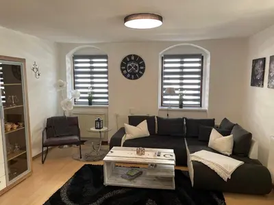 Ein Sitzbereich in der Unterkunft Ferienwohnung Stohn