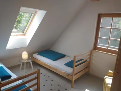 Ein Bett oder Betten in einem Zimmer der Unterkunft Ferienwohnung Brox