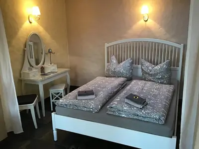 Ein Bett oder Betten in einem Zimmer der Unterkunft Villa Eddi & Emmi