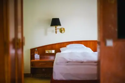 Ein Bett oder Betten in einem Zimmer der Unterkunft Romantik Hotel Bülow Residenz