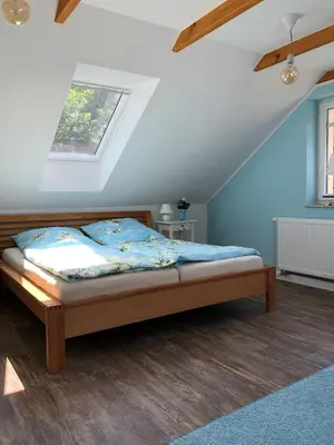 Ein Bett oder Betten in einem Zimmer der Unterkunft Adlerhorst