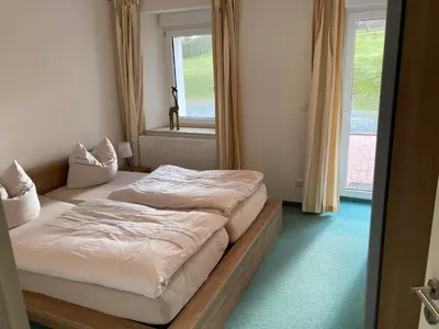 Ein Bett oder Betten in einem Zimmer der Unterkunft Landhaus Böhmer, Ferienwohnung Gohrisch