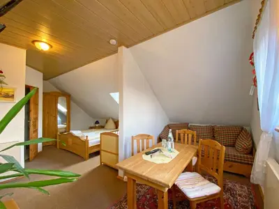 Ein Sitzbereich in der Unterkunft RATAGS Kunsthandwerkerhaus