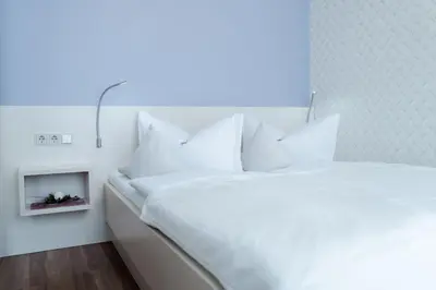 Ein Bett oder Betten in einem Zimmer der Unterkunft Altstadt-Apartment