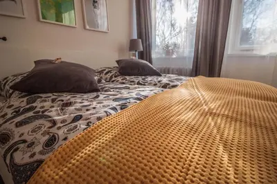 Ein Bett oder Betten in einem Zimmer der Unterkunft GottwaldHaus - Apartment