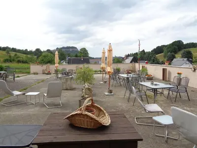 Ein Restaurant oder anderes Speiselokal in der Unterkunft Urlaubsoase-Lindenhof
