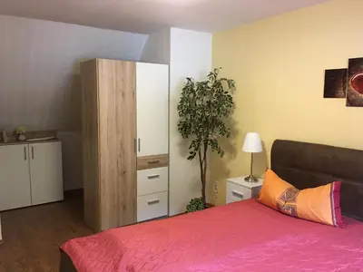 Ein Bett oder Betten in einem Zimmer der Unterkunft Fewo Ehrlich Sächs. Schweiz