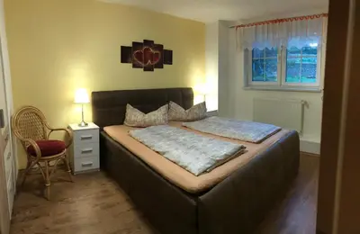 Ein Bett oder Betten in einem Zimmer der Unterkunft Fewo Ehrlich Sächs. Schweiz