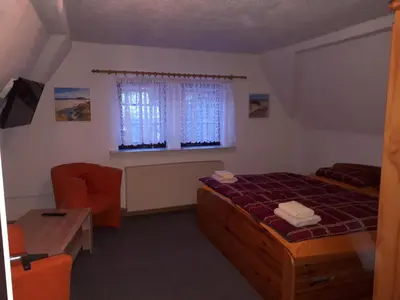 Ein Bett oder Betten in einem Zimmer der Unterkunft Meschkes Gasthaus Pension