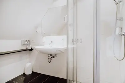 Ein Badezimmer in der Unterkunft Hotel Frauensteiner Hof