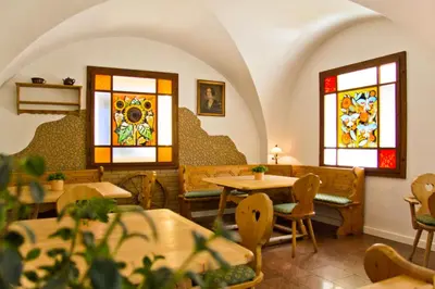 Ein Sitzbereich in der Unterkunft Hotel garni Grundmühle
