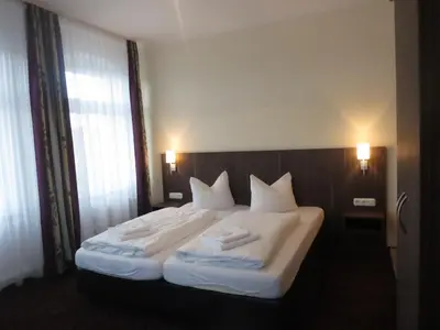 Ein Bett oder Betten in einem Zimmer der Unterkunft Pension Luft