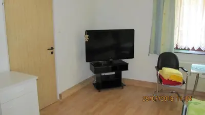 TV/Unterhaltungsangebot in der Unterkunft Ferienzimmer Haus Läsker