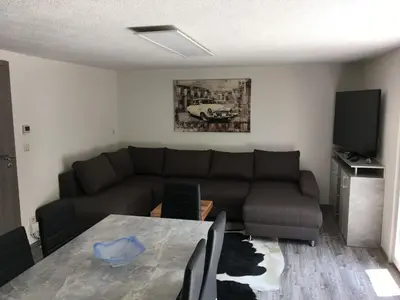 Ein Sitzbereich in der Unterkunft Ferienhaus Seenland
