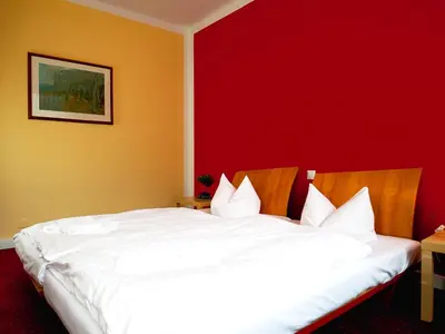 Ein Bett oder Betten in einem Zimmer der Unterkunft Hotel Albrechtshof Gohrisch