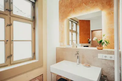 Ein Badezimmer in der Unterkunft Villa Sorgenfrei und Restaurant Atelier Sanssouci