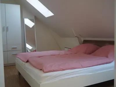 Ein Bett oder Betten in einem Zimmer der Unterkunft Uferlos