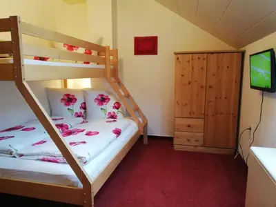 Ein Bett oder Betten in einem Zimmer der Unterkunft Ferienhof Höhensonne