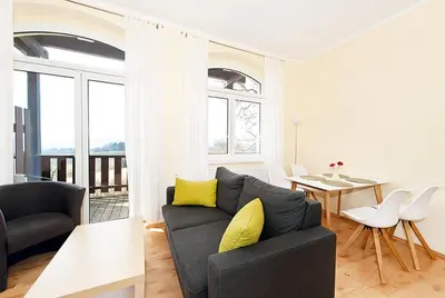 Ein Sitzbereich in der Unterkunft Panorama-Apartments Weinberghaus