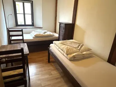 Ein Bett oder Betten in einem Zimmer der Unterkunft Ferienwohnung LATERNENSTUBE mit Familienbett - 8 Pers - Rittergut Leppersdorf vor Radeberg bei Dresden