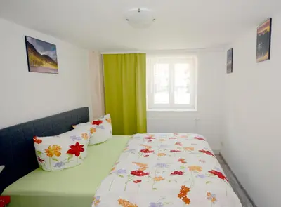 Ein Bett oder Betten in einem Zimmer der Unterkunft Grafenblick, Ferienwohnung mit Aussicht!