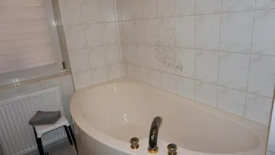Ein Badezimmer in der Unterkunft Ferienwohnung Albrecht Strandkorb