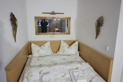 Ein Bett oder Betten in einem Zimmer der Unterkunft Villa Belvedere
