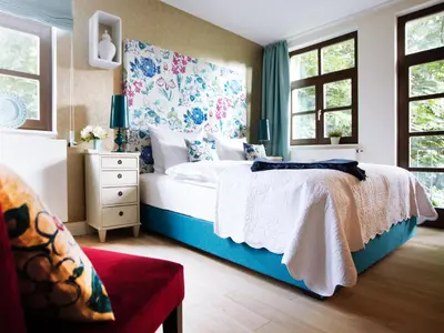 Ein Bett oder Betten in einem Zimmer der Unterkunft Fährhaus Meißen B&B