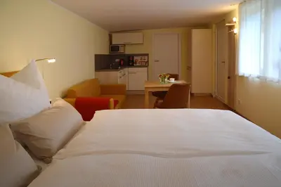Ein Bett oder Betten in einem Zimmer der Unterkunft Ferienquartier Goethe33