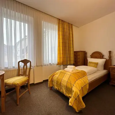 Ein Bett oder Betten in einem Zimmer der Unterkunft Das Sigl's