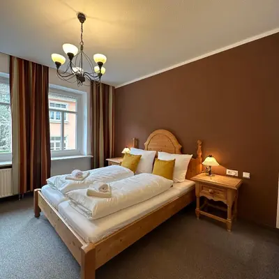 Ein Bett oder Betten in einem Zimmer der Unterkunft Das Sigl's