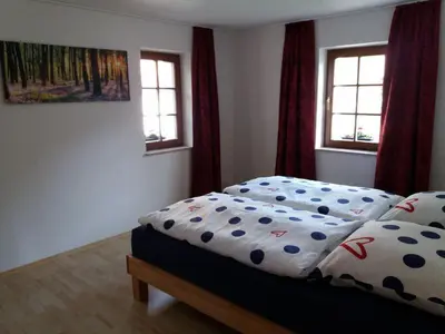Ein Bett oder Betten in einem Zimmer der Unterkunft Ferienwohnung Wolf