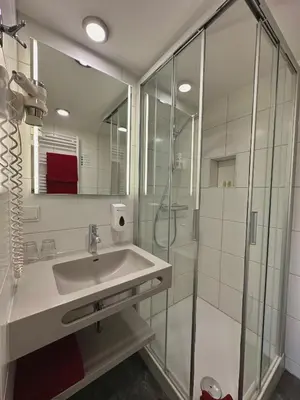 Ein Badezimmer in der Unterkunft Hotel Folklorehof