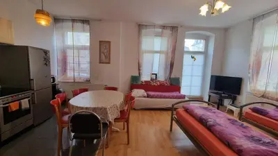 Ein Sitzbereich in der Unterkunft Apartment Karin