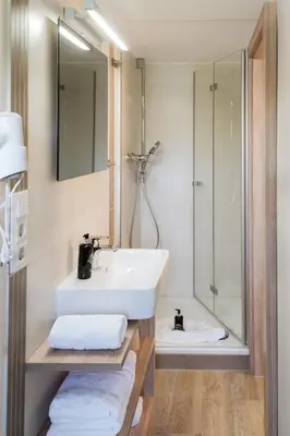 Ein Badezimmer in der Unterkunft Pension Hotel Sartor